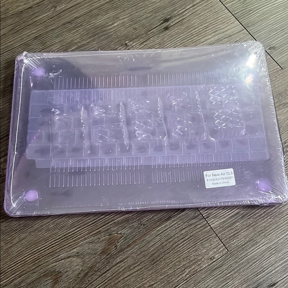 Light Purple Laptop Sleeve with Textured Surface and Decorative Design